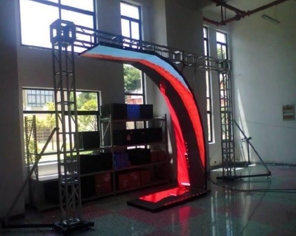 Cabinets mounted at angle of curved LED display